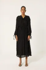 ROBE SPÉCIALE REMBOURRÉE ET FRONCÉE