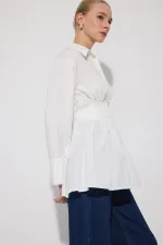 PEPLUM TUNIC WITH CORSET AT THE WAIST