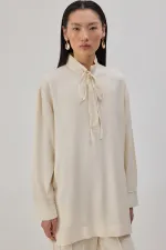 YAKASI BAĞLAMALI DÖKÜMLÜ TUNİK