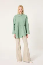 CHEMISE ASYMÉTRIQUE AVEC DÉTAILS PLISSÉS