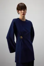 DRAPED BLOUSE WITH METAL ACCESSORIES