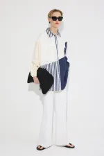 CHEMISE À COULEURS UNIES AVEC POCHES