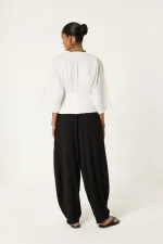 PANTALON EN CRÊPE PLISSÉ