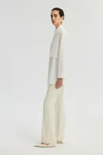 ASYMMETRICAL SHIRT WITH PLEATED DETAILS