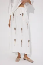 JUPE À PERLES AVEC TAILLE ÉLASTIQUE