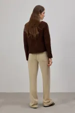 KISA BOY DÜĞMELİ TRİKO HIRKA