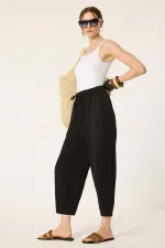 PANTALON CAROTTE AVEC TAILLE ÉLASTIQUE PANTALON CAROTTE AVEC TAILLE ÉLASTIQUE