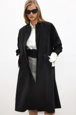Maxi-size trench coat Maxi-size trench coat