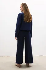 CHEMISE COURTE À BOUTONS DORÉS