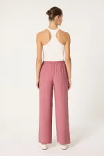PANTALON À JAMBES LARGES AVEC TAILLE ÉLASTIQUE