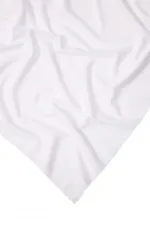 CHÂLE EN MOUSSELINE TRICOTÉE