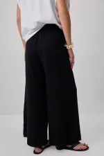 WIDE-LEG MUSLIN PANTS WITH POCKETS