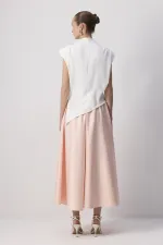 JUPE EN SATIN À VOLANTS