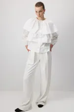 CHEMISE COURTE À VOLANTS