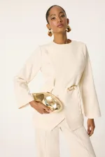 Ensemble tunique et pantalon asymétrique avec détail de ceinture