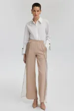 PANTALON EN LIN AVEC DÉTAILS EN ORGANZA