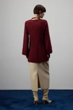 DRAPED BLOUSE WITH METAL ACCESSORIES