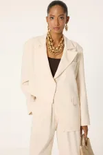 ENSEMBLE VESTE ET PANTALON ASYMÉTRIQUE