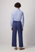 PANTALON À TAILLE ÉLASTIQUE ET JAMBES LARGES