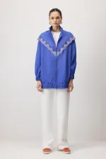 EMBROIDERED RAINCOAT