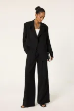 ENSEMBLE VESTE ET PANTALON ASYMÉTRIQUE