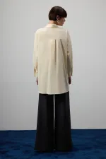 PLEATED ASYMMETRICAL POPLIN SHIRT