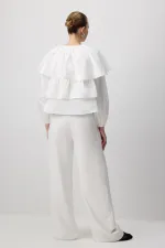 CHEMISE COURTE À VOLANTS