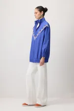 EMBROIDERED RAINCOAT