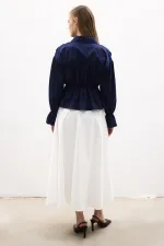 CHEMISE À NŒUD HABILLÉE