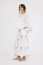 JUPE À PERLES AVEC TAILLE ÉLASTIQUE