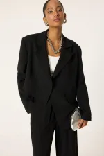 ENSEMBLE VESTE ET PANTALON ASYMÉTRIQUE