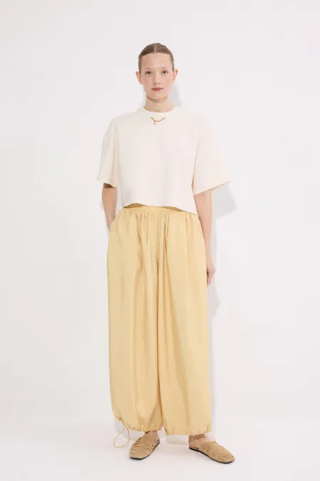 PANTALONS À BONNETS ÉLASTIQUES