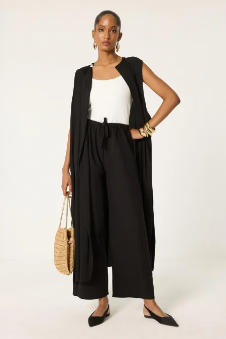 PANTALON LOGAL À JAMBES LARGES