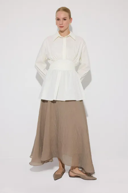 PEPLUM TUNIC WITH CORSET AT THE WAIST