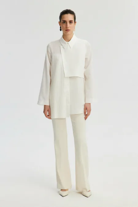 CHEMISE ASYMÉTRIQUE AVEC DÉTAILS PLISSÉS