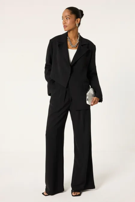 ENSEMBLE VESTE ET PANTALON ASYMÉTRIQUE