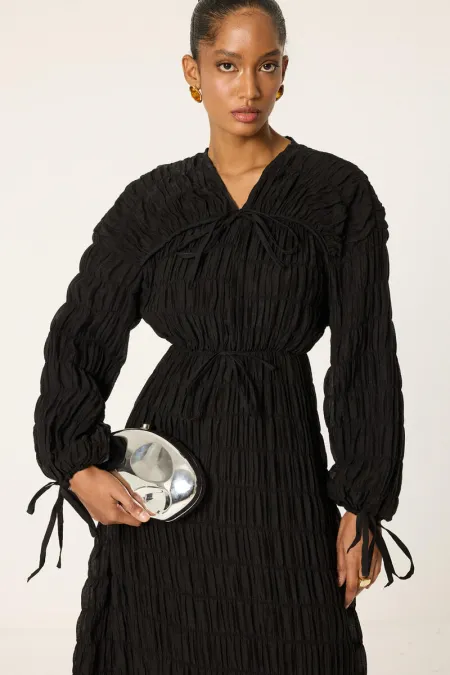 ROBE SPÉCIALE REMBOURRÉE ET FRONCÉE