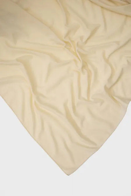 CHÂLE EN MOUSSELINE TRICOTÉE