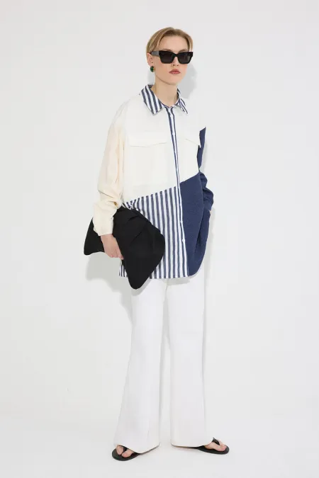 CHEMISE À COULEURS UNIES AVEC POCHES