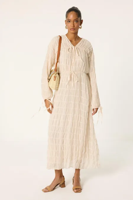 ROBE SPÉCIALE REMBOURRÉE ET FRONCÉE