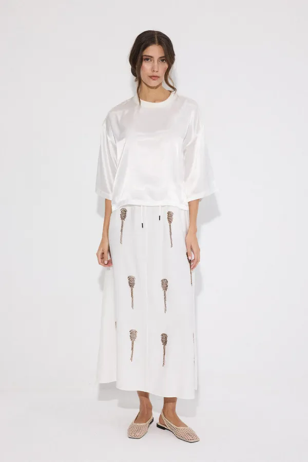 JUPE À PERLES AVEC TAILLE ÉLASTIQUE