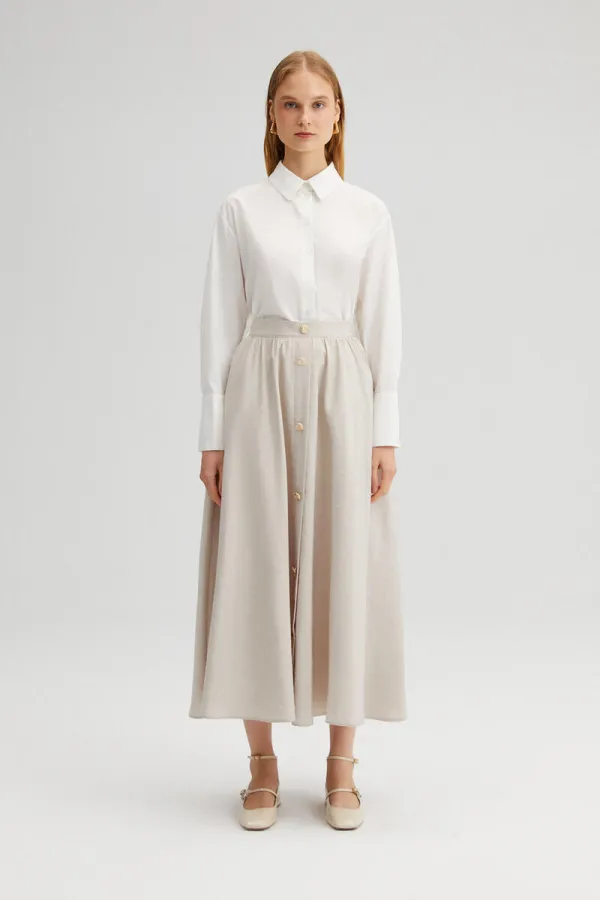 JUPE CUPRA À BOUTONS DORÉS