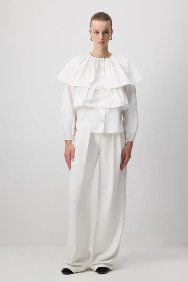 CHEMISE COURTE À VOLANTS