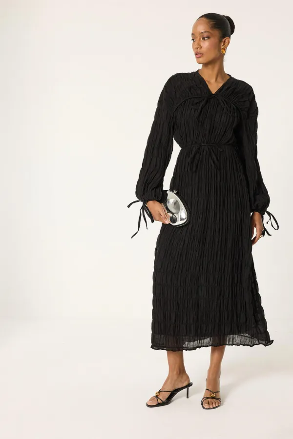 ROBE SPÉCIALE REMBOURRÉE ET FRONCÉE