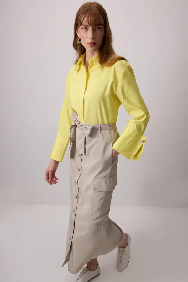 GENİŞ CEPLİ KUPRA ETEK