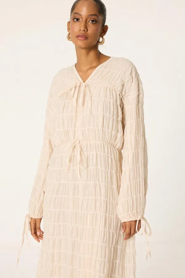 ROBE SPÉCIALE REMBOURRÉE ET FRONCÉE