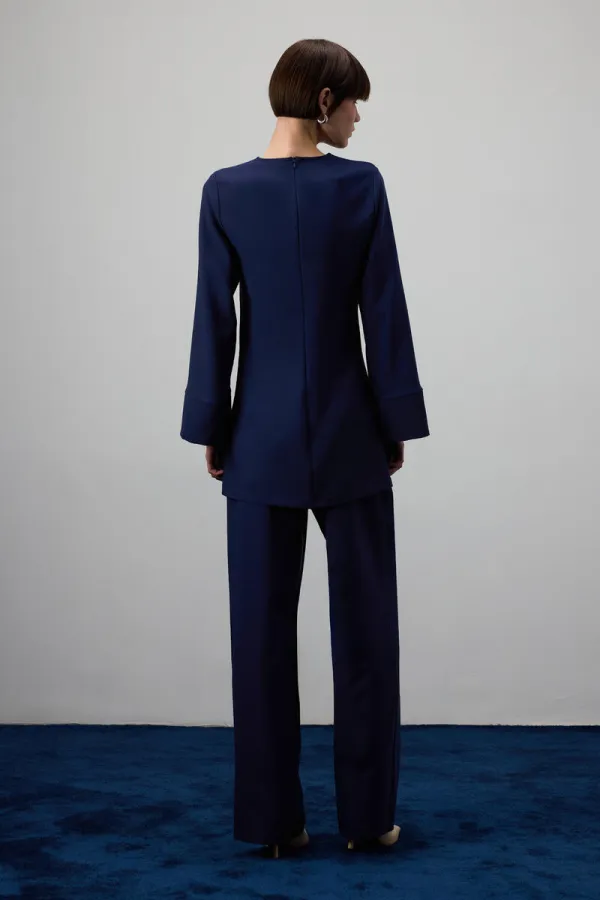 DRAPED BLOUSE WITH METAL ACCESSORIES