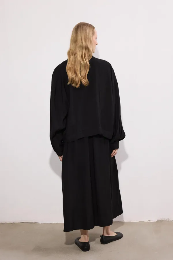 Ensemble veste et jupe drapées en cupra