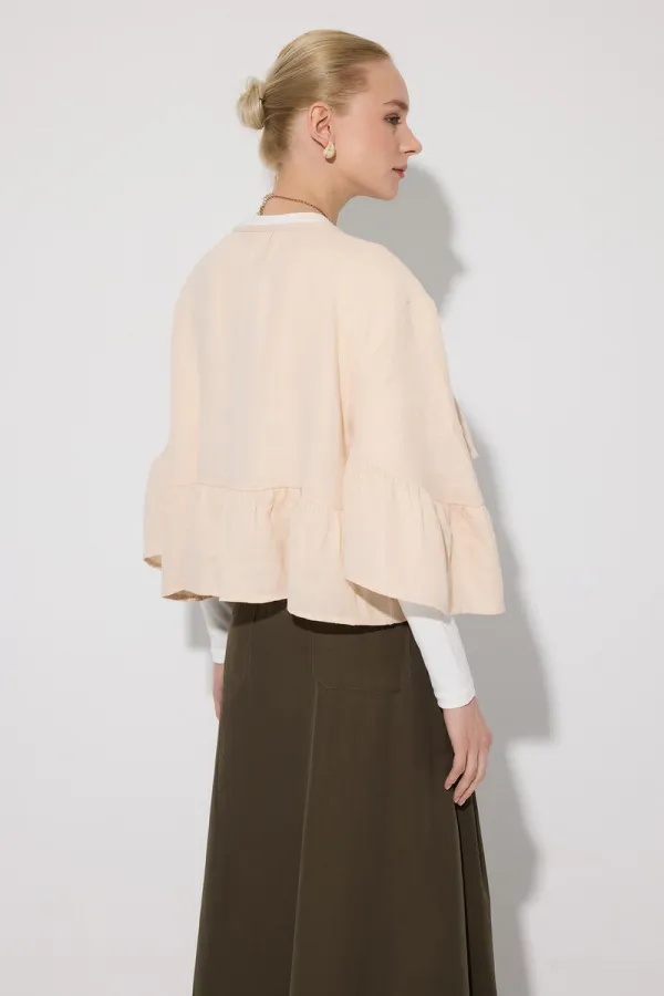 CHEMISE EN MOUSSELINE À MANCHES EN AILES DE CHAUVE-SOURIS