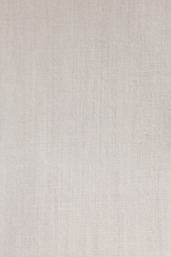 ASYMMETRICAL CUT SHIRT WITH BUTTON DETAIL ASYMMETRICAL CUT SHIRT WITH BUTTON DETAIL
